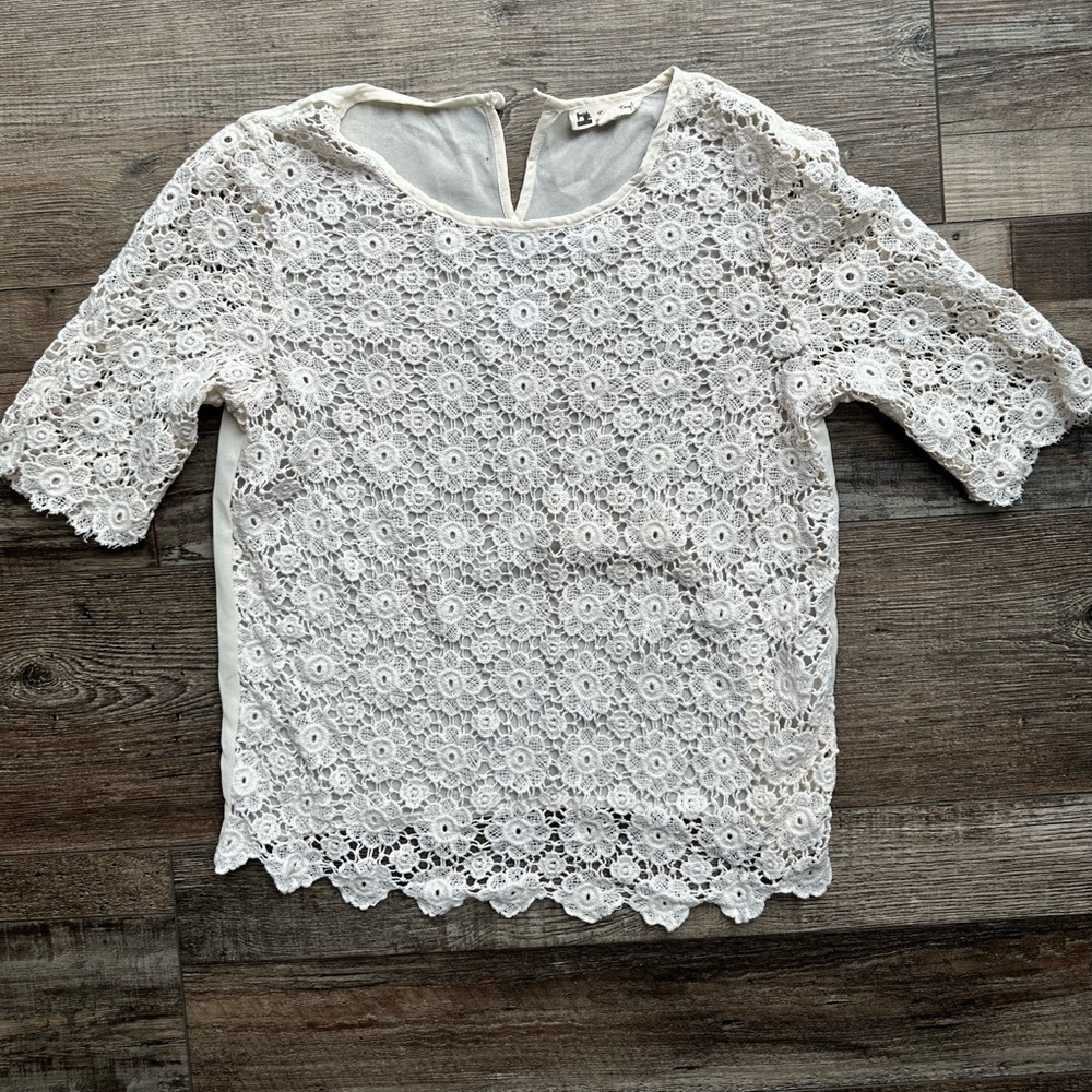 Cotton candy woman’s flowered embroidered top